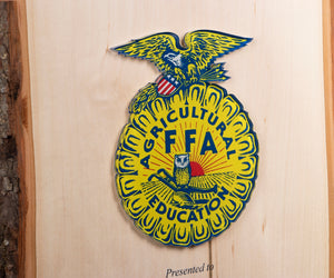 Close up photo of FFA logo on a wooden plaque