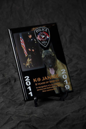 Police K-9 award plaque with photo of dog sitting on grey background